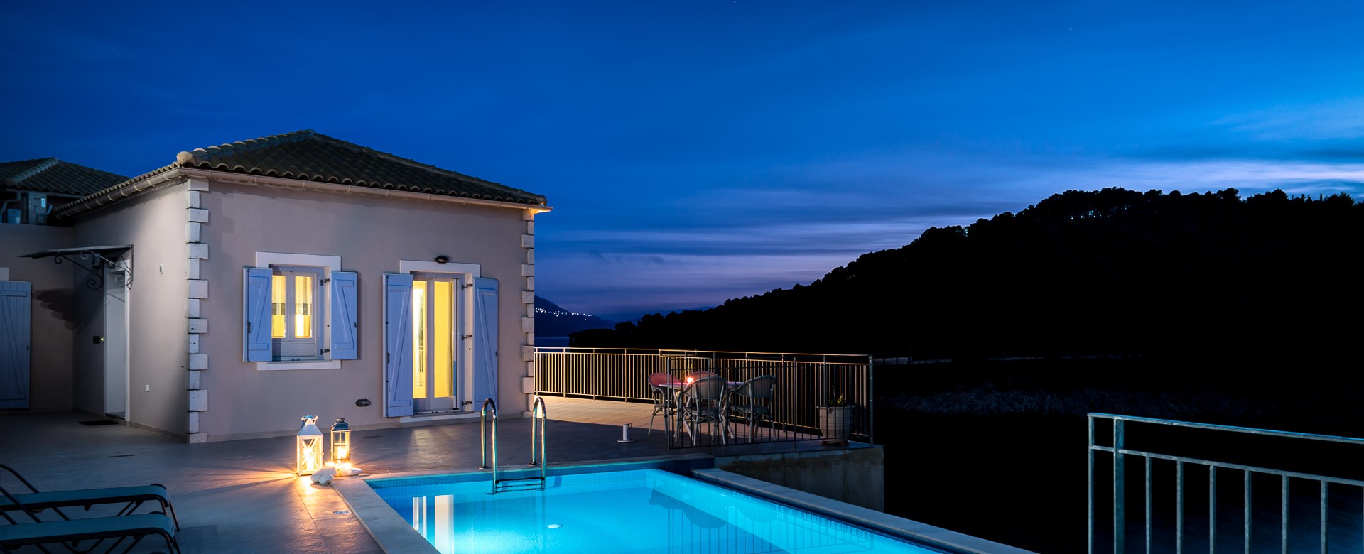 Mood lighting and an infinity pool ready for an evening swim at Villa Plori, Assos, Kefalonia