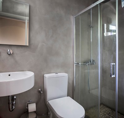 Bathroom with shower and basin inside Beachfront Suite No1, Lourdata, Kefalonia