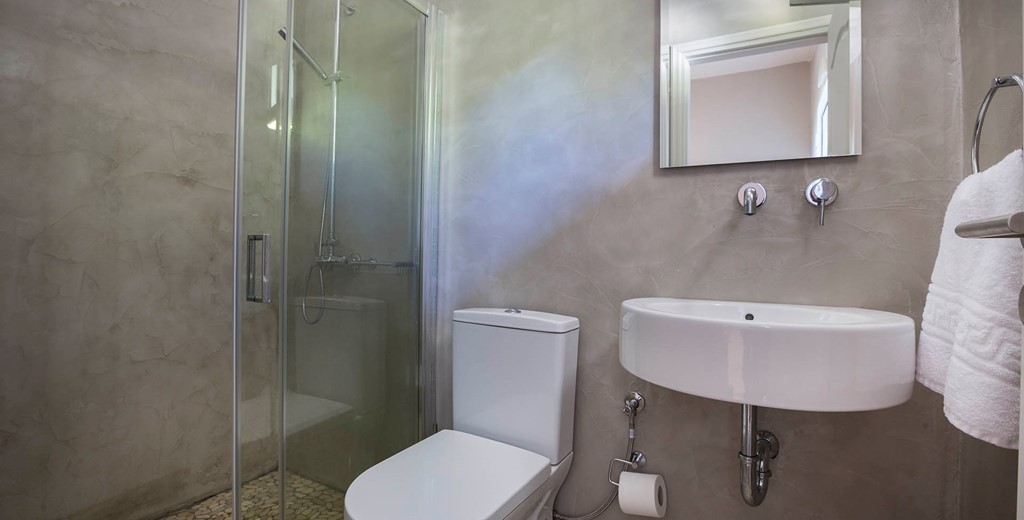 Bathroom with shower and basin inside Beachfront Suite No2, Lourdata, Kefalonia