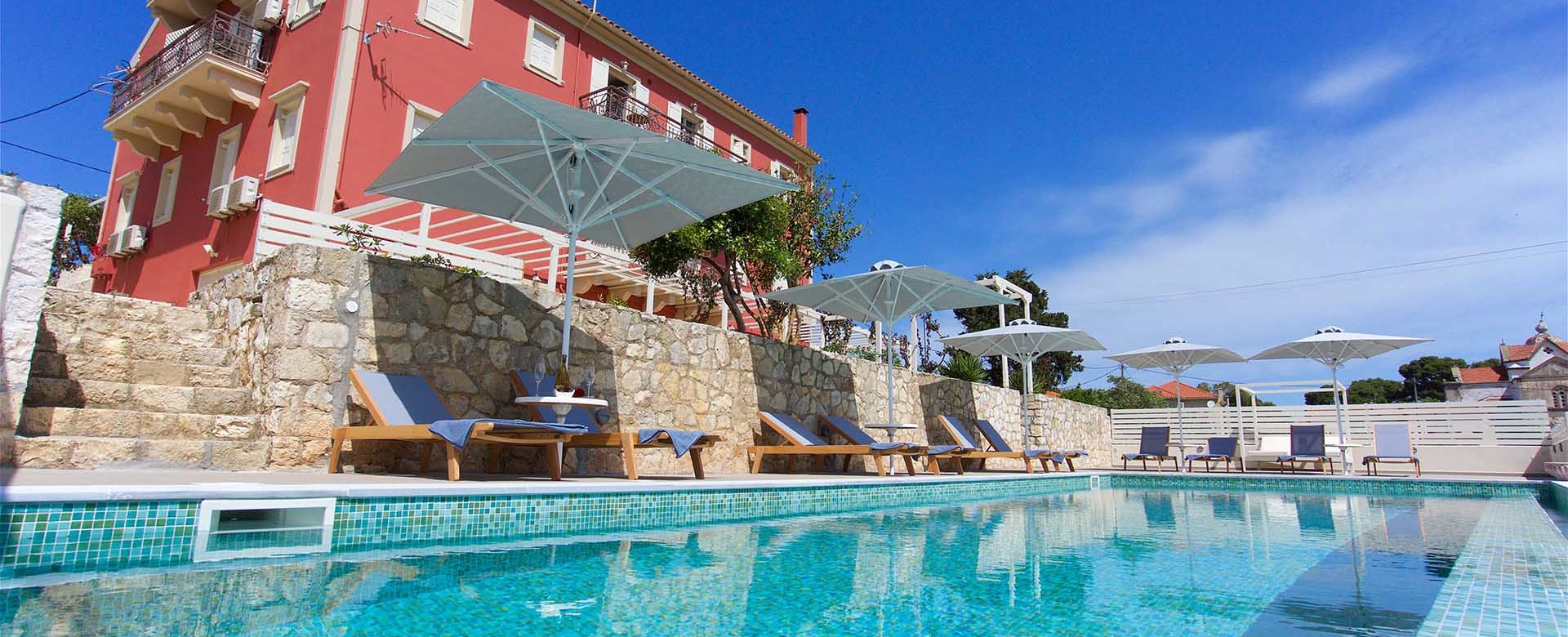 Relax in the pool and take in the sky during your holiday to Magnolia Apartments, Fiscardo, Kefalonia, Greek Islands