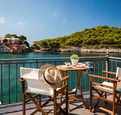Take in the waterfront from the balcony at Thalassa House, Assos, Kefalonia, Greek Islands