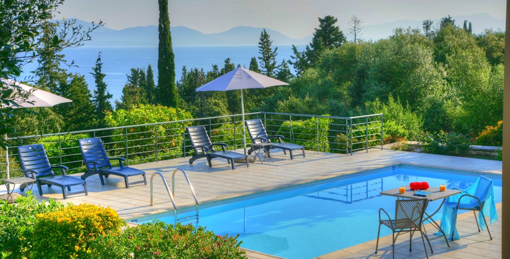 Beautiful view across pool towards the sea and mountains at Villa Gaeta Fiscardo, Kefalonia, Greek Islands