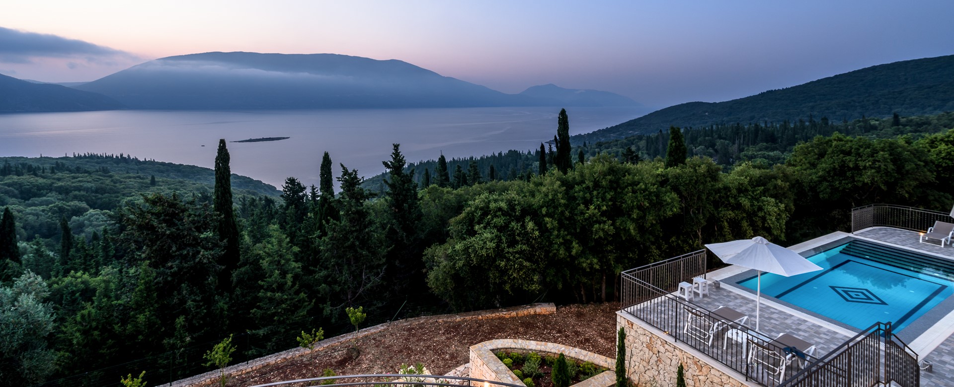 Uninterrupted views across sea to island of Ithaca from every terrace at Villa Gionis Fiscardo, Kefalonia, Greek Islands