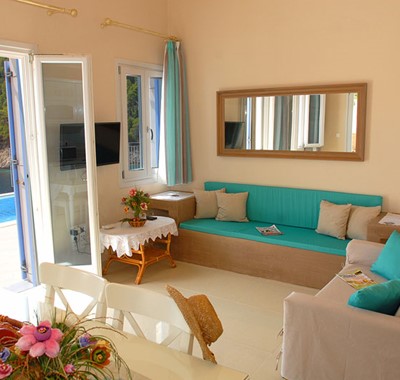 Comfortable lounge space with a view inside Villa Panorama, Assos, Kefalonia