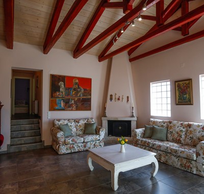 Relax in the comfy high vaulted open plan lounge at Rosie's Herb Cottage, Assos, Kefalonia, Greek Islands