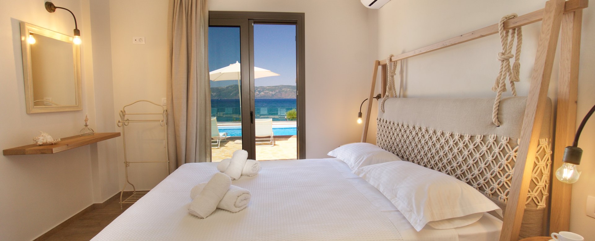 Comfortable large double bed with a view inside Villa Frydi, Karavomilos, Kefalonia, Greek Islands